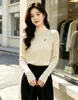 Suéter de dos piezas de lana gruesa hilada en núcleo de cuello alto para mujer, nuevo y elegante top de punto ajustado para mujer