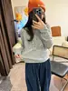 Camiseta de mujer de cuello redondo, hombros rectos, manga larga, nuevo estilo primavera y otoño, estampado de pato de dibujos animados retro americano, top versátil ajustado para mujer