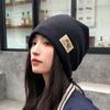 Otoño e invierno 2022 Nuevo gorro de pelo para hombre y mujer, gorro cálido de punto, cálido para exteriores, casual, versátil, orejeras, gorro de postparto, moda