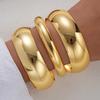 Moda Coreana Estilo Europeu e Americano Transfronteiriço Pulseira Exagerada com Linhas Fluidas em Forma de Gota d'Água, Textura Metálica e Superfície Lisa, Design de Abertura em Mola