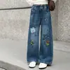 Calça jeans feminina, nova coleção outono 2026, calça pantalona estilosa com estampa de desenho animado para crianças, calça de primavera e outono para meninas mais velhas