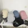 Mochila feminina 2023 novo estilo coreano ins multi-funcional mochila masculina e feminina ensino fundamental Escola Primária bolsa de patrocínio Bolsa para estudante universitário