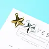 Accesorios de joyería NIANXING Aleación NIANXING 21 mm estrella de cinco puntas tridimensional de doble cara