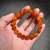 Pulsera de madera de pino del noreste con cuentas de barril para hombre, hecha de madera de agar del norte de la montaña Changbai y madera de ámbar, cuentas budistas de madera de dragón de sangre totalmente translúcidas
