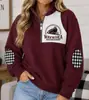 Jaqueta europeia e americana transfronteiriça feminina com blocos de cor e zíper parcial na gola alta, apresentando estampa digital 3D, corte solto estilo street style e propriedades corta-vento.