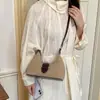 Moda coreana nicho 2026 otoño nuevo bolso tipo dumpling de gran capacidad, vintage de alto valor para el trabajo, hombro y bandolera para mujer