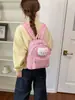 Nova mochila de pelúcia Hello Kitty com estampa de leopardo 2026, estilo coreano, fofa, de grande capacidade, bolsa escolar casual para meninas