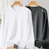 Camiseta casual versátil de manga comprida para outono para homens, gola redonda, cor sólida da moda, confortável, respirável e com caimento solto