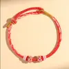 Pulseira Nó Flor de Pêssego Tecida à Mão Corda de Mão Lírio do Vale DIY Benmingnian Pode Ser Enfiado Contas Corda Vermelha Semiacabada Homens e Mulheres