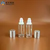 Botella de vidrio transparente redonda recta de 30 ml del fabricante en stock para loción y sérum con cabezal de bomba, botella vacía para dispensar base de maquillaje líquida