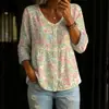 Nova camisa feminina de manga comprida com botões e gola V estampada transfronteiriça, elegante e estilosa para o trabalho, top casual único e moderno