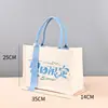 Bolsas de lona personalizadas transfronterizas con un toque de alta gama, bolsas de regalo navideñas, bolsas de lona promocionales para empresas