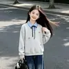 Traje Estilo Coreano Primavera y Otoño 2026 Nuevo Diseño Bloque de Color Falso Dos Piezas Sudadera Conjunto de Dos Piezas Jeans Casual Tendencia