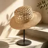 Nuevo Sombrero de Paja Tejida Estilo Vacaciones al Aire Libre Europeo y Americano de Verano para Mujer Sombrero de Sol con Protección Solar Copa Plana Calado Sombrero de Paja de Rafia