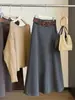 Elegante Saia de Terno de Lã Cinza para Mulheres Outono/Inverno 2026 Novo Estilo Draping Linha A Barra Larga Saia Longa