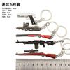 Arma devoradora de pollos periférica mini MK14awm 98K Glock sks rueda izquierda m416 juguete llavero traje