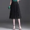 Falda plisada de encaje simple y elegante para mujer, nueva falda de línea A de cintura alta adelgazante de longitud media con dobladillo grande, otoño e invierno 2026
