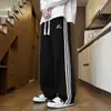 Pantalones casuales nuevos, elegantes y modernos, de estilo japonés con un aire literario y artístico, versátiles y fáciles de combinar, perfectos para un look relajado de Harajuku en 2026, estilo hombre