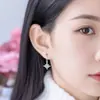 Nuevo Diseño de Nicho de Henson Jewelry Aro para Oreja Sin Costura de 0.8 mm de Diámetro Colgante de Cruz Joyería para Piercing