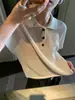 Top de Malha Oco de Manga Curta Estilo Old Money de Verão com Gola Polo para Mulheres Top Pequeno de Seda Gelada com Lapela de Temperamento de Alta Qualidade
