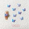 Libro Rojo mismo estilo dos colores mariposa fritilaria joyería para uñas al por mayor Diamantes para uñas francesas decoraciones para uñas