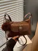 Bolso de hombro retro de nicho transfronterizo para mujer, nuevo de otoño 2026, versátil, de gran capacidad, para el trabajo, de hombro o cruzado