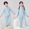 Pijama para Niños Otoño e Invierno Nueva Ropa de Casa Infantil Forro Polar y Engrosado Niños Medianos y Grandes Niñas Pequeñas Traje Térmico de Terciopelo Austriaco