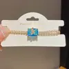 Pulsera con Hebilla Cuadrada de Mariposa con Circonita Chapada en Oro Real de 18k Pulsera de Diseño Moderno Joyería de Mano Versátil para Mujeres Venta al por Mayor