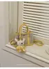 Bolsas de mano de moda artísticas y de nicho para mujer, primavera 2026, bolsos tipo cubo, bolsos para el día a día, bolsos cruzados para mujer