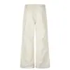 Pantalones holgados de pierna ancha para hombre con un estilo de moda urbana, que presentan diseños de cuentas y remaches metálicos, pantalones casuales únicos y ligeramente acampanados