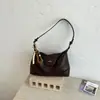 Bolso cruzado de diseño nicho francés para mujer, modelo nuevo 2026, bolso de axila tipo empanada de alta gama, bolso de hombro y cruzado