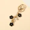 Colgante de Perla con Flor de Cerezo Colorida Estilo Ins Hebilla Metálica en Forma de U Llavero Colgante Pequeño Decorativo Dulce Venta al por Mayor