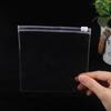 Bolsa de PVC con cremallera, bolsa con etiqueta de PVC, bolsa transparente, bolsa con etiqueta de cuello, bolsa con botón plano, bolsa de plástico en stock con hebilla, bolsa con marca de envío