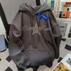 Moletom com Capuz Popular Estilo High Street para Mulheres Outono e Inverno 2025 Veludo Espessado Solto Estilo Casual Preguiçoso Top