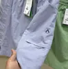 26 nova saia curta de verão ao ar livre estilo montanha cintura elástica absorvente de suor respirável anti-exposição bolso à prova d'água roupa de trabalho saia curta evasê