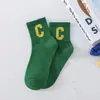 Estilo coreano Dongdaemun ins cor de doce arco-íris cor contrastante letra C estilo esportivo curto top baixo meias respirável básico