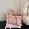 Bolsa feminina de design de nicho de alta qualidade transfronteiriça 2026 nova moda bolsa de mão bolsa de balde versátil bolsa de ombro e transversal