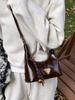 Bolsas Femininas de Nicho Tendência Outono e Inverno 2026 Nova Popular Versátil Crossbody Bolsa Bolinho Pequena Bolsa de Mão
