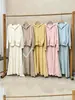 Conjunto de estilo coreano, un conjunto completo de las nuevas llegadas de otoño e invierno 2026, conjunto de dos piezas para mujer con suéter con capucha y cremallera y falda de punto de cintura alta