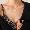 Collar y pendientes de ópalo con diseño versátil de nicho francés, joyería de acero de titanio transfronterizo resistente a la decoloración.