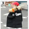 Ropa infantil abrigo acolchado de algodón para niñas 2023 Invierno nuevo estilo coreano para niños medianos y grandes abrigo acolchado de algodón de longitud media con cuello de pelo para niños