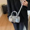 Bolsa de Mão de Moda Transfronteiriça com Laço Design Cilíndrico para Mulheres, Novo Estilo Verão 2026, Pingente de Espelho Personalizado, Bolsa de Ombro Único Transversal