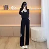 Conjunto de moda casual de alta gama para mujer, nuevo estilo chino de otoño, con una sudadera abotonada y pantalones anchos estampados, un conjunto de dos piezas moderno