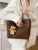 Bolsa de Ombro Casual Nicho Retrô de Grande Capacidade Feminina Nova Moda Outono 2025 e Bolsa Tote Prática para o Dia a Dia