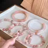 Venta al por mayor Perlas de Flor de Durazno Rosado Perlas Redondas Jade de Seda Dorada Perlas Sueltas de Flor de Durazno Accesorios para Pulseras de Mujer Perlas Promoción de Transmisión en Vivo