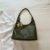 Bolsa de mano de gran capacidad de color liso, nueva bolsa de hombro retro de moda para el verano 2026, bolsa de axila de moda para el trabajo y los desplazamientos