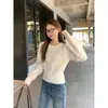 Suéter de punto grueso liso estilo coreano con cuello redondo para mujer, nuevo modelo primavera 2026, top interior de punto petite que reduce la edad