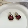Aretes Geométricos Rojos Ankela Festivos de Año Nuevo Nicho Temperamento Venta Caliente Aretes de Botón Otoño/Invierno 2026 Venta al por Mayor de Pendientes