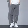 Calças Jeans Masculinas Outono e Inverno Forradas com Lã 2026 Novo Estilo Jogger Harem Casuais Longas Calças de Inverno Masculinas Engrossadas