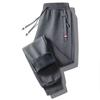 Pantalones cortos gruesos con forro polar para hombre, estilo coreano, estilo retro americano, otoño e invierno de 2023, pantalones deportivos casuales de moda con cordones en los tobillos